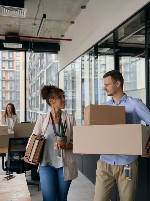 young-company-employees-preparing-for-office-moving